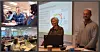 To foredragsholdere står foran en presentasjon, mens deltakere arbeider i et kurslokale.